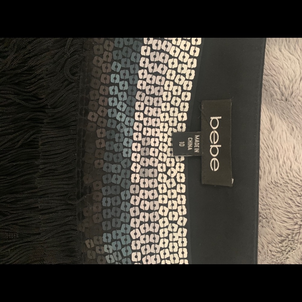 Bebe Fringed mini skirt